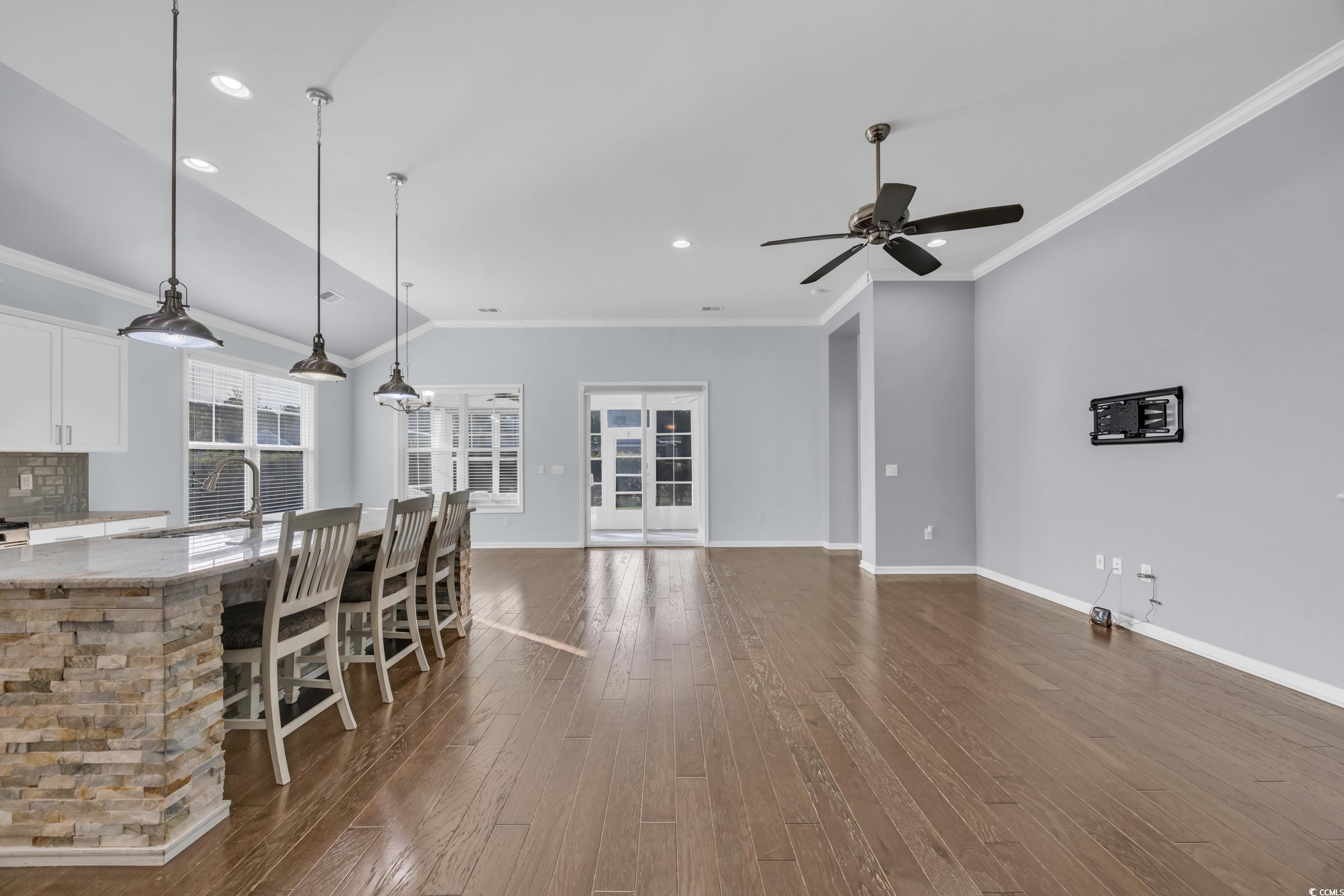 351 Firenze Loop Myrtle Beach, SC 29579 - Photo 10 of 37 Kitchen featuring a ceiling fan, white cabinetry,