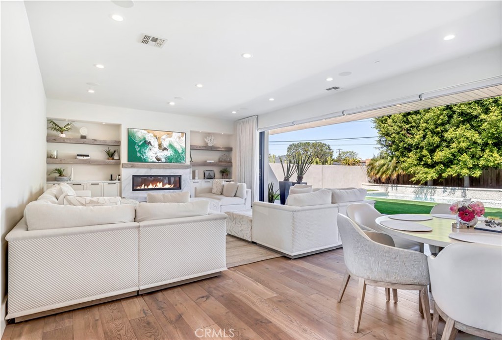 660 Kings Road Newport Beach, CA 92663 - Photo 5 of 41 a living room with furniture and a large window