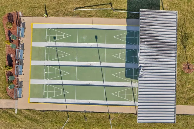 a view of a car in front of a building