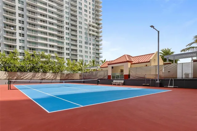 a view of a outdoor kitchen with a large window