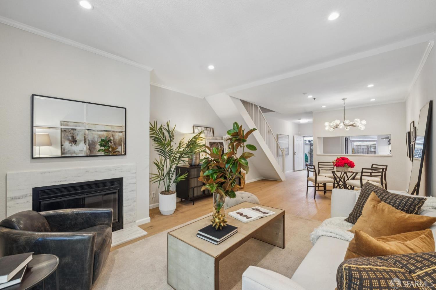 2075 Sutter Street, Unit 215 San Francisco, CA 94115 - Photo 3 of 14 a living room with furniture and a fireplace