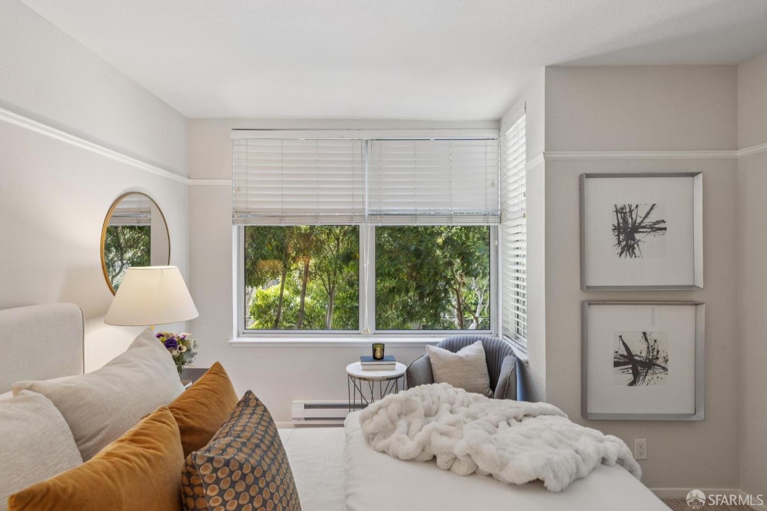 2075 Sutter Street, Unit 215 San Francisco, CA 94115 - Photo 10 of 14 a living room with furniture and a large window