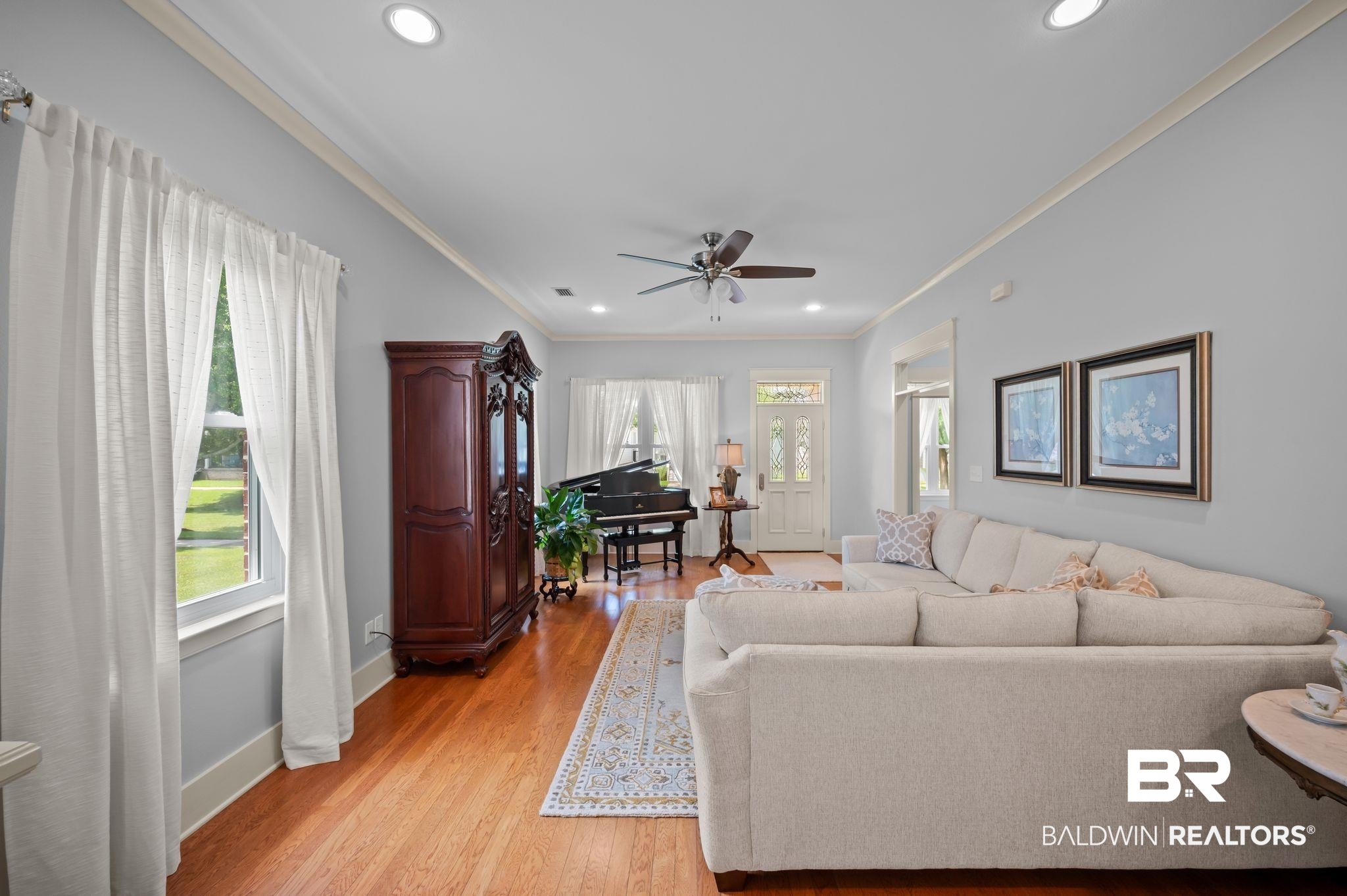 905 Buttercup Lane Foley, AL 36535 - Photo 15 of 47 Living room with healthy amount of natural light, crown molding, light wood finished floors, recessed lighting, and ceiling fan