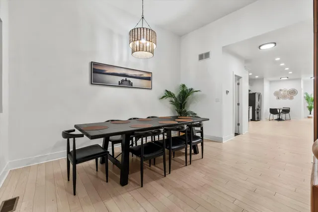 a kitchen with stainless steel appliances kitchen island granite countertop a sink and cabinets
