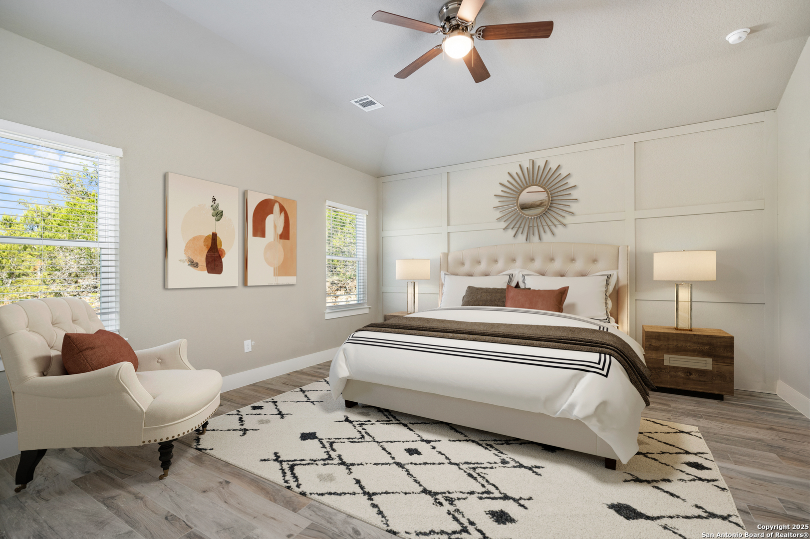 141 Prairie Tea Spring Branch, TX 78070 - Photo 11 of 26 a spacious bedroom with a bed and a chandelier