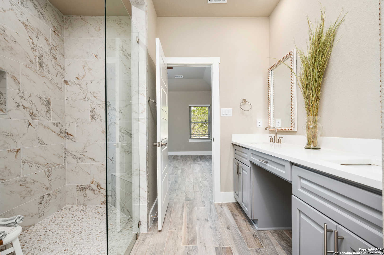 141 Prairie Tea Spring Branch, TX 78070 - Photo 14 of 26 a bathroom with a granite countertop sink and a mirror