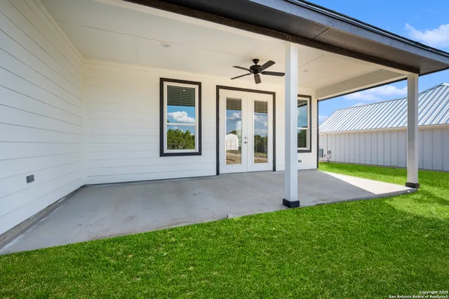 a view of a yard in front of a house