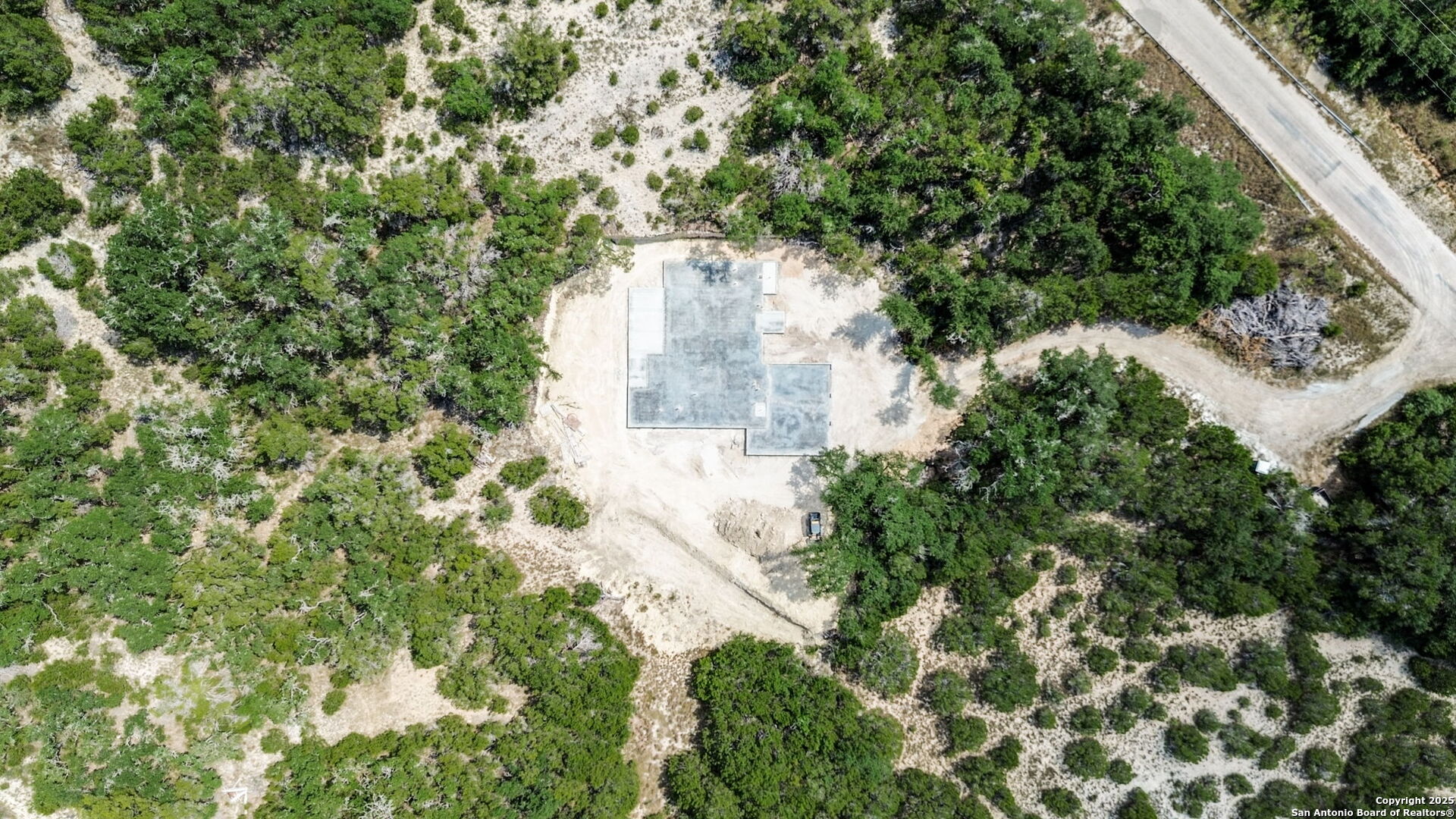 141 Prairie Tea Spring Branch, TX 78070 - Photo 3 of 26 an aerial view of a house with yard