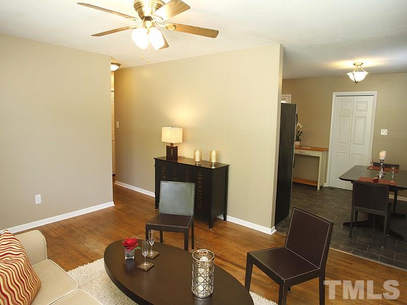 3428 Apache Drive Raleigh, NC 27609 - Photo 4 of 15 a living room with furniture and wooden floor