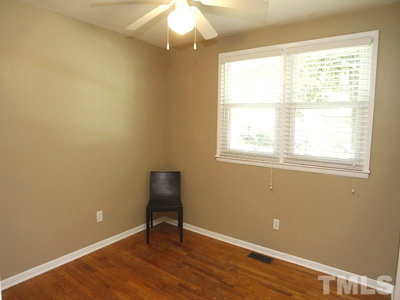 3428 Apache Drive Raleigh, NC 27609 - Photo 10 of 15 an empty room with a window