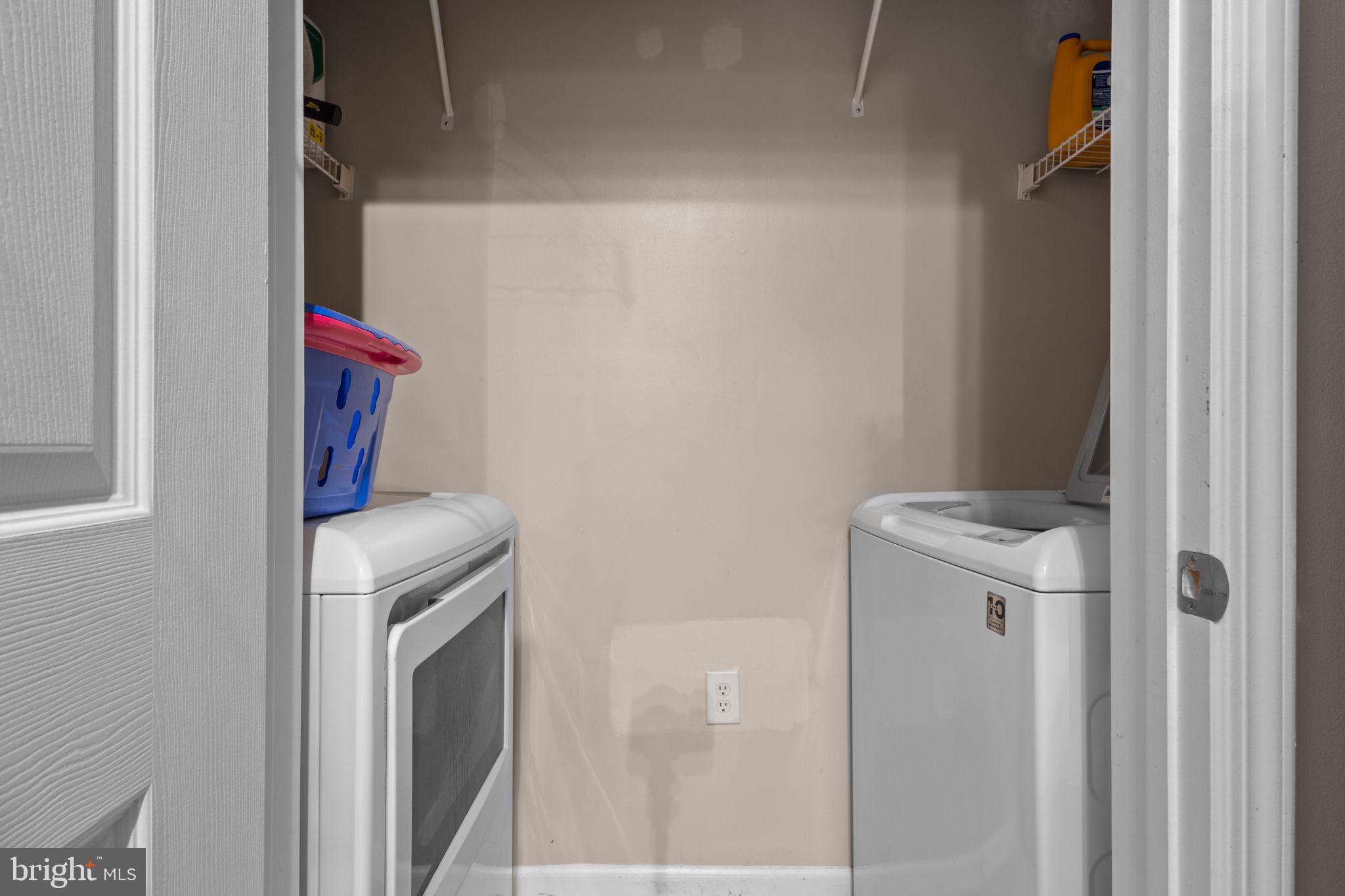 508 Sunset View Terrace Southeast, Unit 302 Leesburg, VA 20175 - Photo 17 of 30 a utility room with dryer and washer