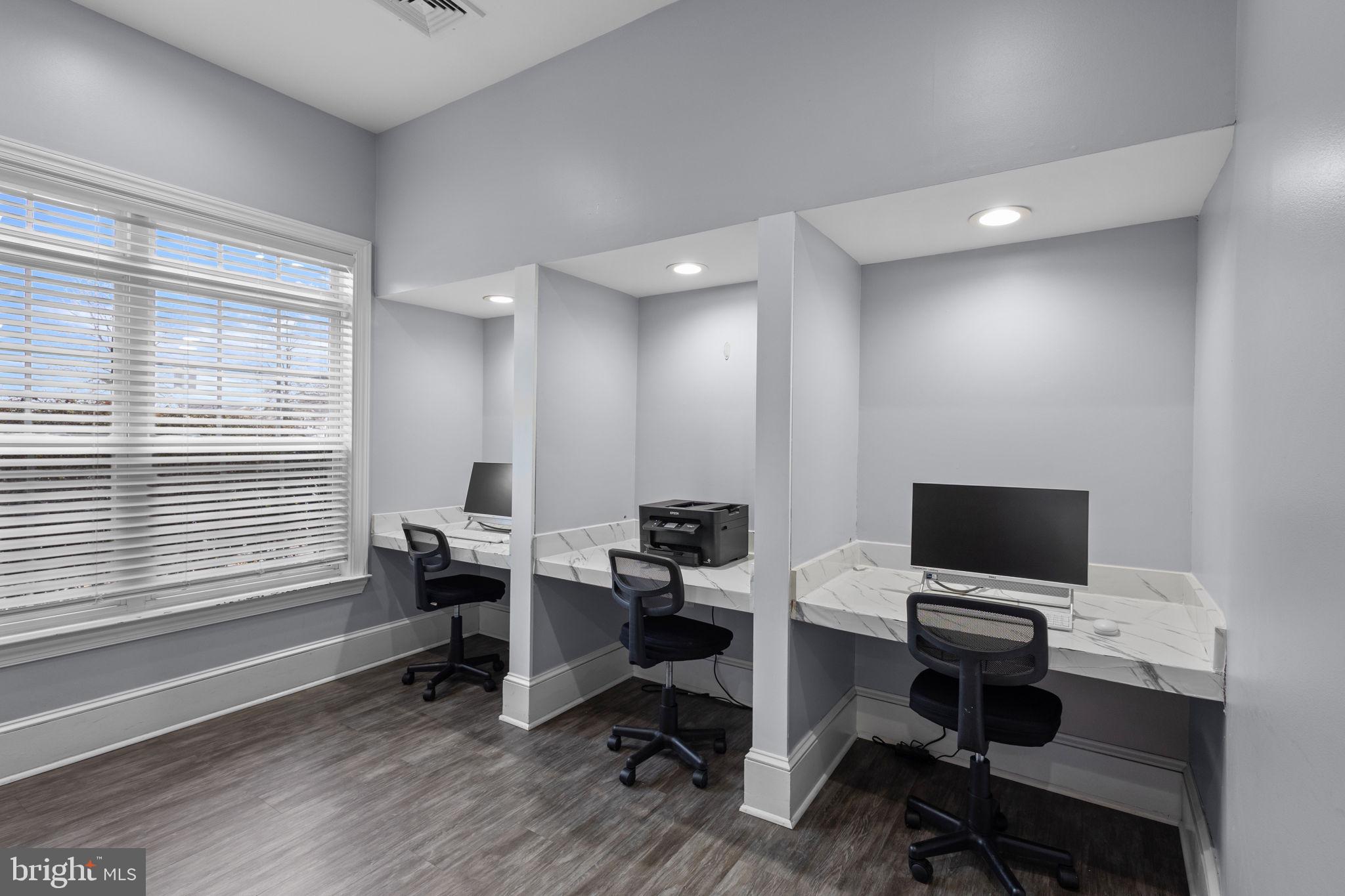 508 Sunset View Terrace Southeast, Unit 302 Leesburg, VA 20175 - Photo 25 of 30 a view of a workspace with furniture and a window