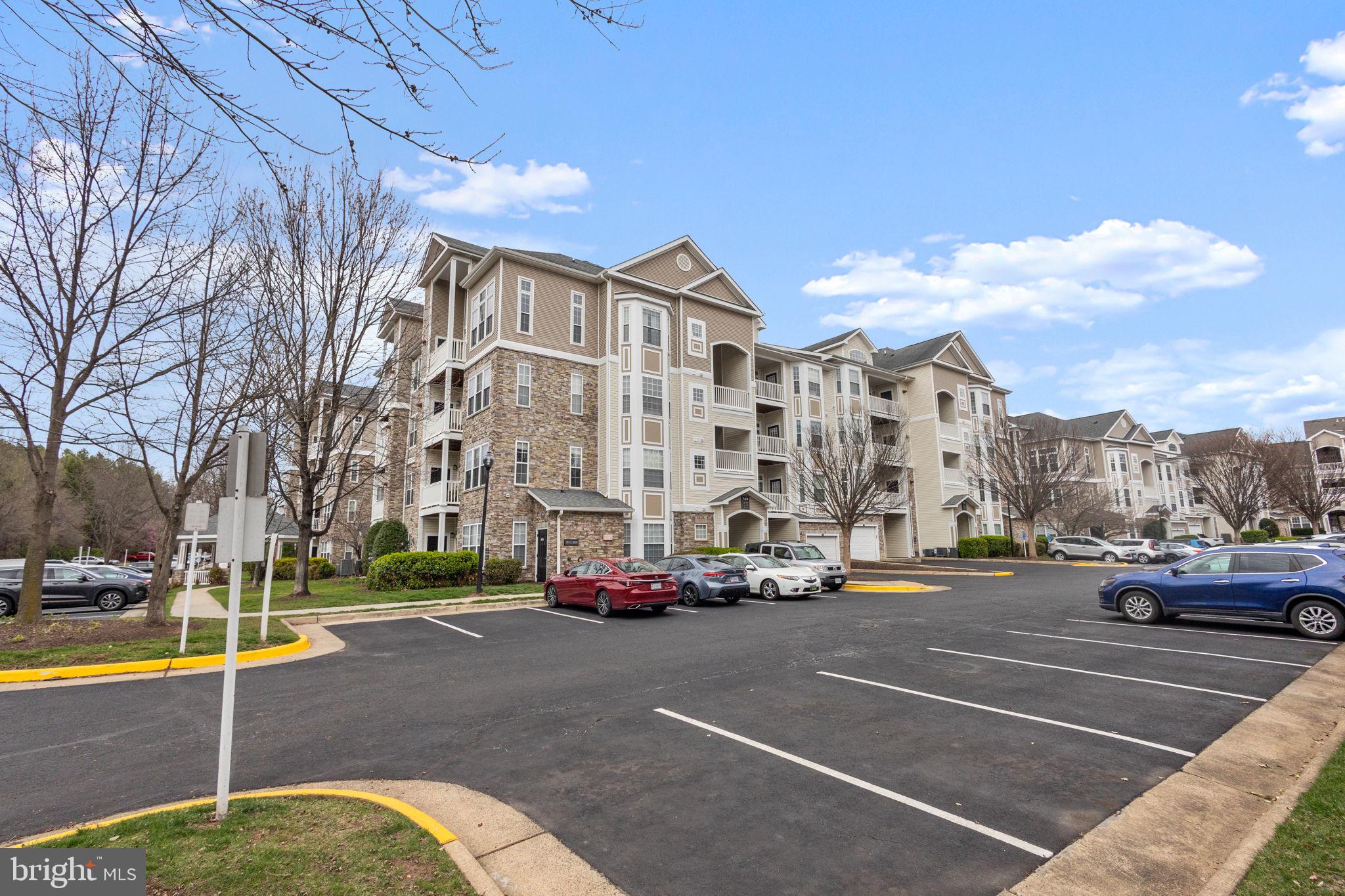 508 Sunset View Terrace Southeast, Unit 302 Leesburg, VA 20175 - Photo 30 of 30 a view of a street with cars