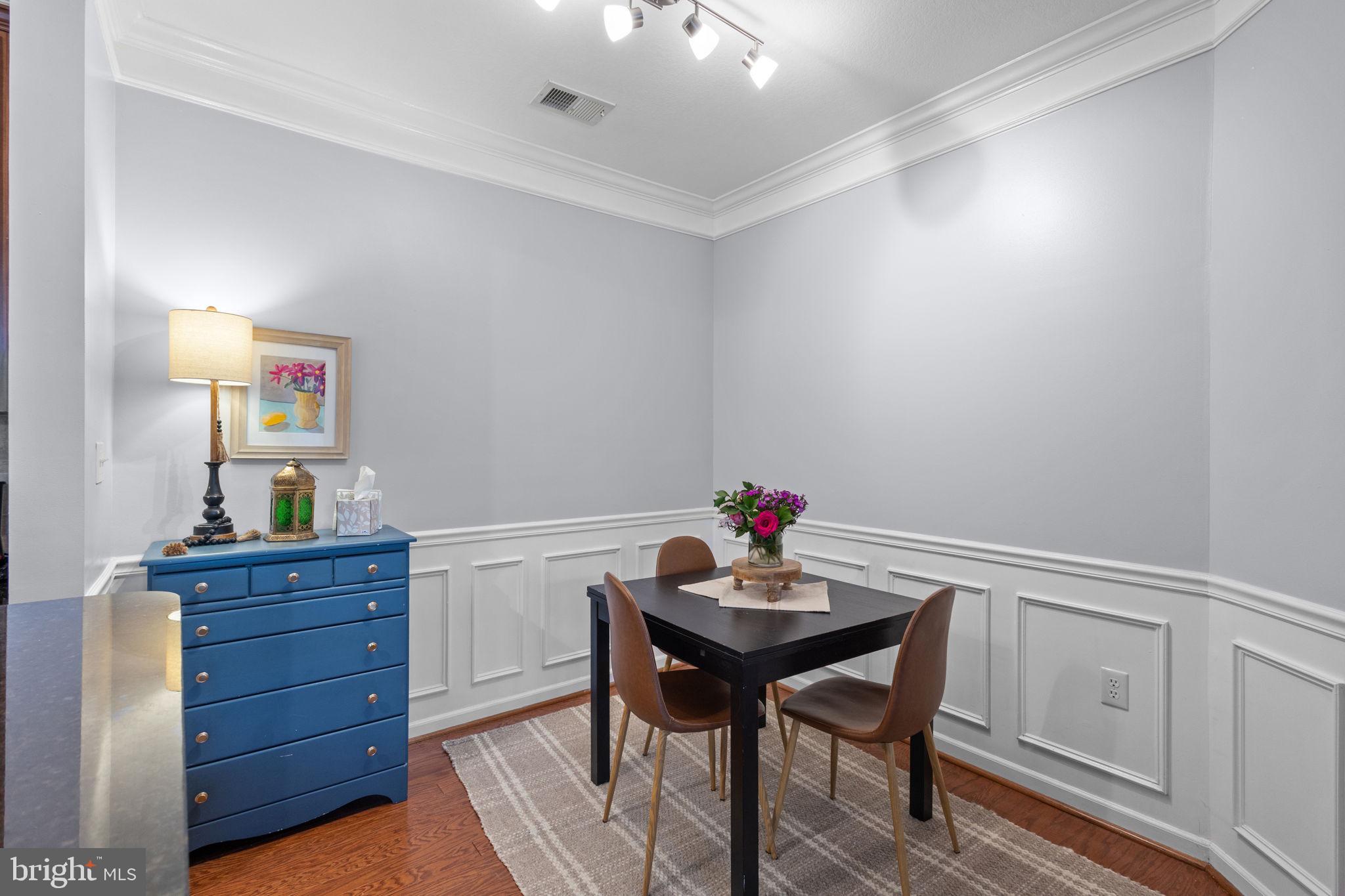 508 Sunset View Terrace Southeast, Unit 302 Leesburg, VA 20175 - Photo 5 of 30 a workspace with furniture and wooden floor