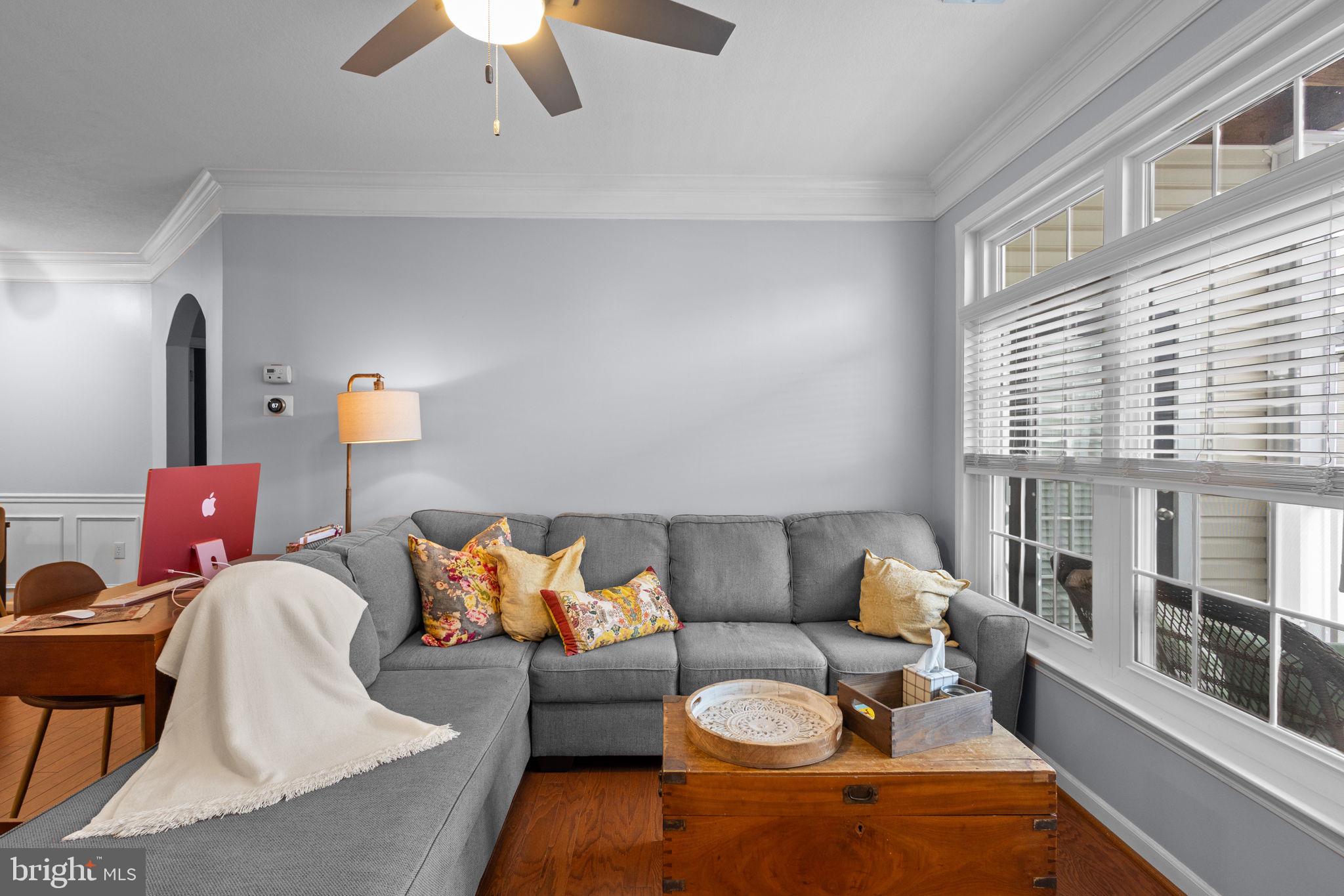 508 Sunset View Terrace Southeast, Unit 302 Leesburg, VA 20175 - Photo 10 of 30 a living room with furniture and a large window