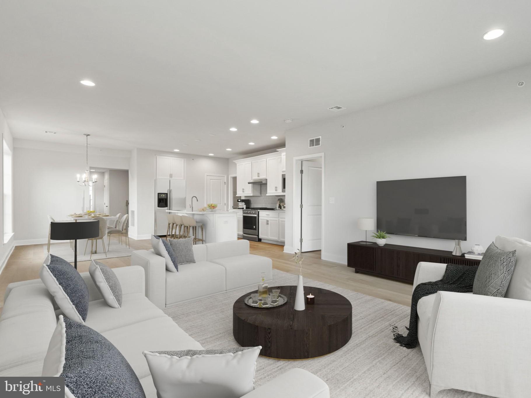 104 Merchant Avenue, Unit ANDERS Mount Joy, PA 17552 - Photo 3 of 12 a living room with furniture and a flat screen tv