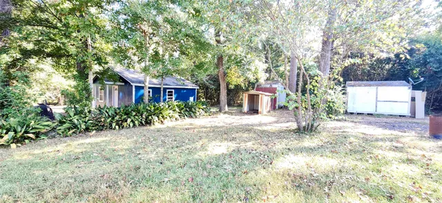 a house with trees in front of it