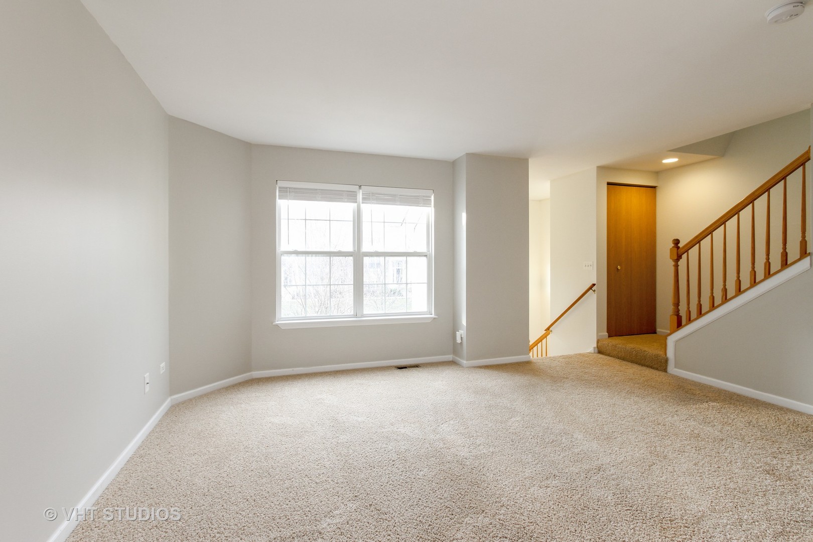34379 North Barberry Road Round Lake, IL 60073 - Photo 5 of 10 a view of an empty room with a window