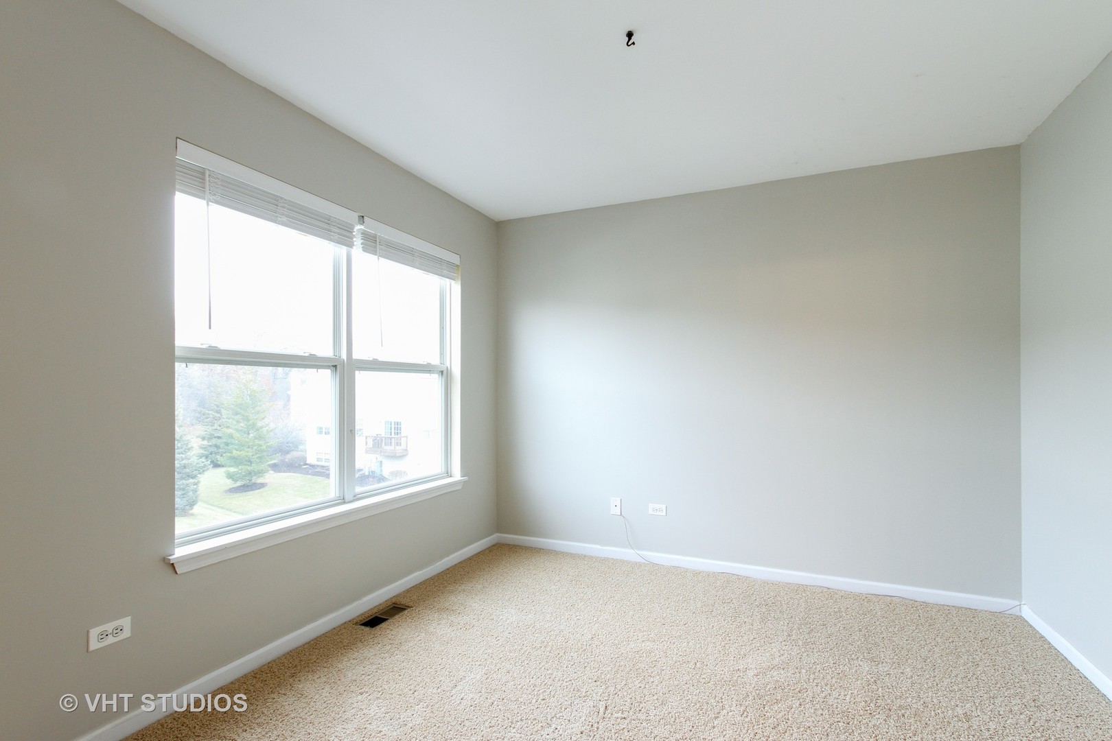 34379 North Barberry Road Round Lake, IL 60073 - Photo 8 of 10 an empty room with windows