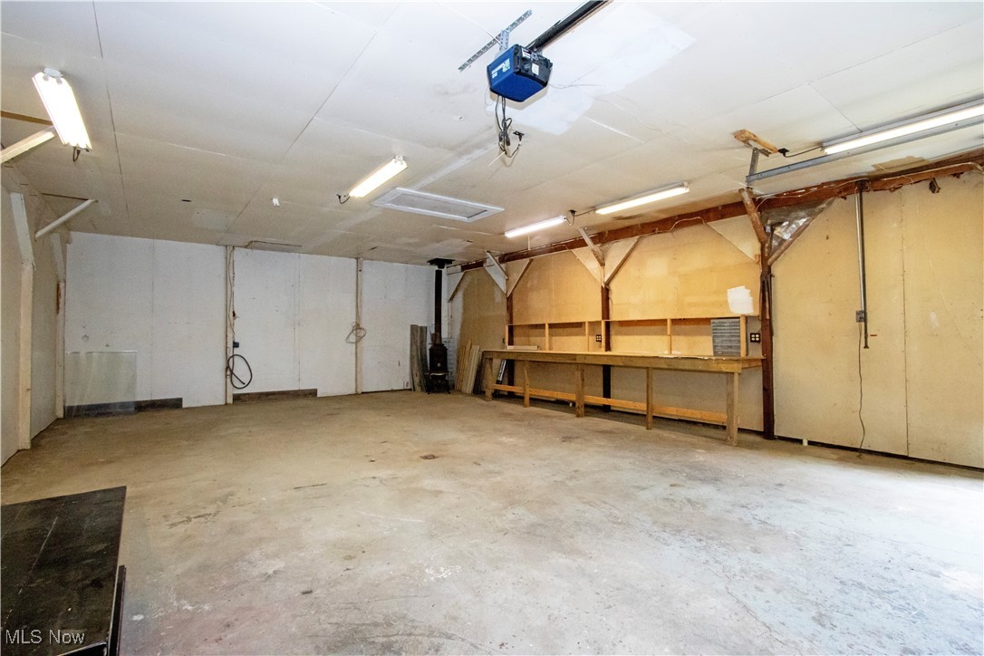 2276 Schellin Road Wooster, OH 44691 - Photo 46 of 48 Garage with a garage door opener