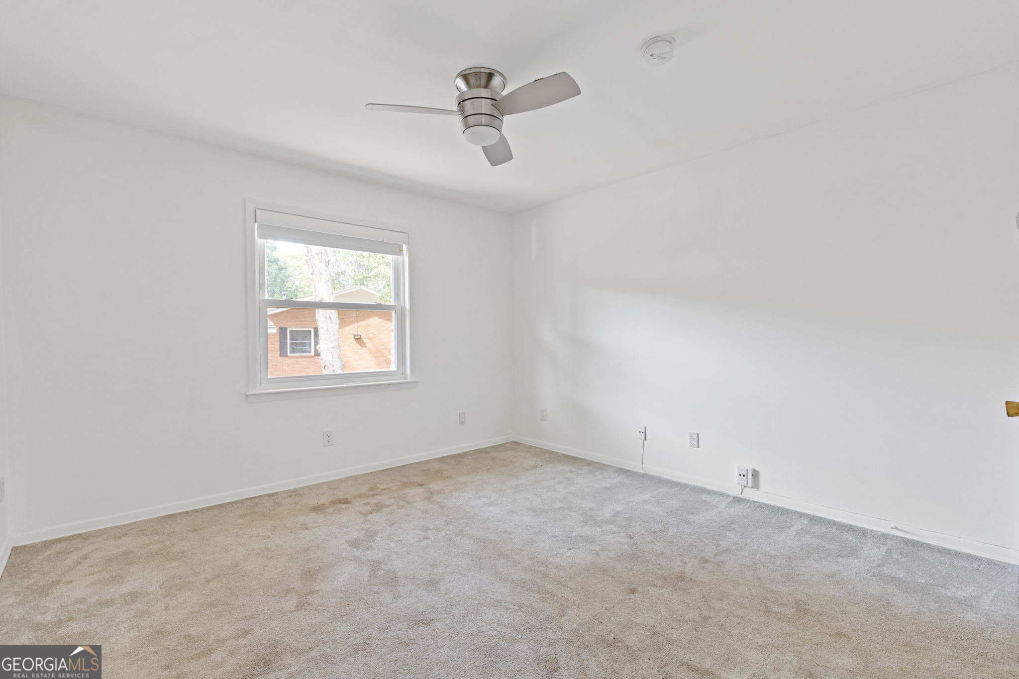 3510 Roswell Road Northwest, Unit C2 Atlanta, GA 30305 - Photo 17 of 24 an empty room with a window