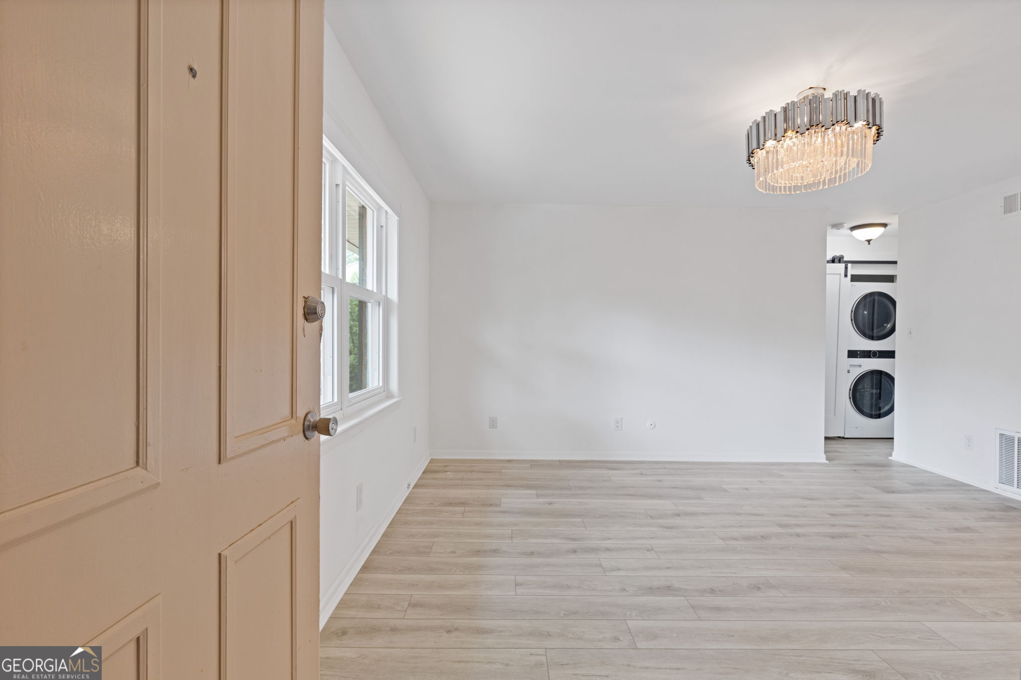 3510 Roswell Road Northwest, Unit C2 Atlanta, GA 30305 - Photo 3 of 24 a view of a hallway with wooden floor