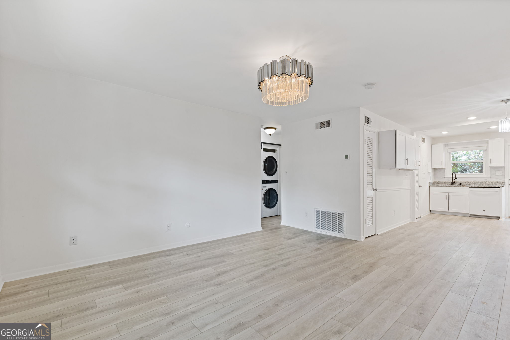 3510 Roswell Road Northwest, Unit C2 Atlanta, GA 30305 - Photo 6 of 24 a view of a room with wooden floor and window
