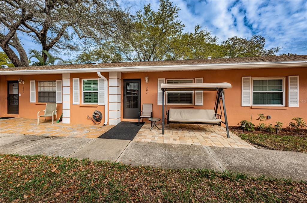 2250 Druid Road, Unit 502 Clearwater, FL 33764 - Photo 1 of 1 front view of a house with a yard
