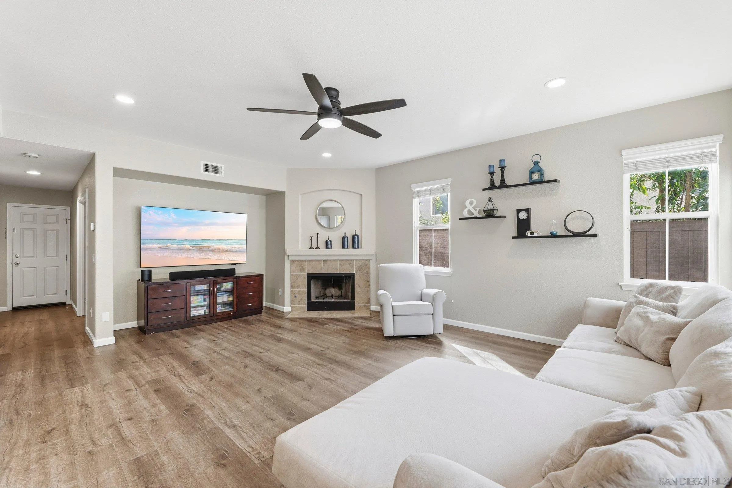 1514 West Borden Road San Marcos, CA 92069 - Photo 13 of 40 a living room with furniture and a fireplace
