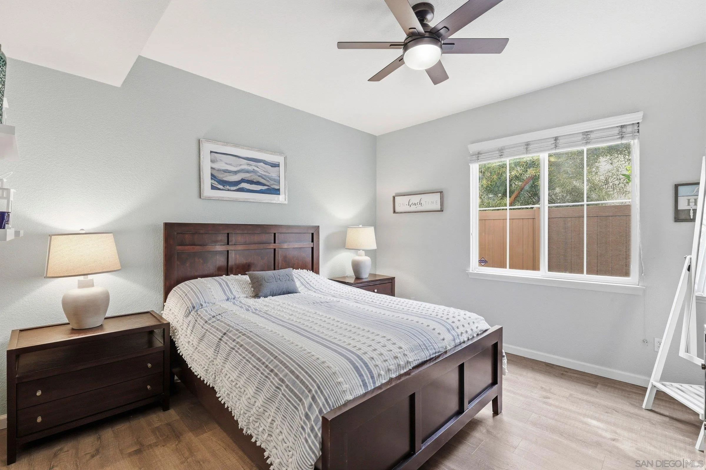 1514 West Borden Road San Marcos, CA 92069 - Photo 16 of 40 a bedroom with a bed and window