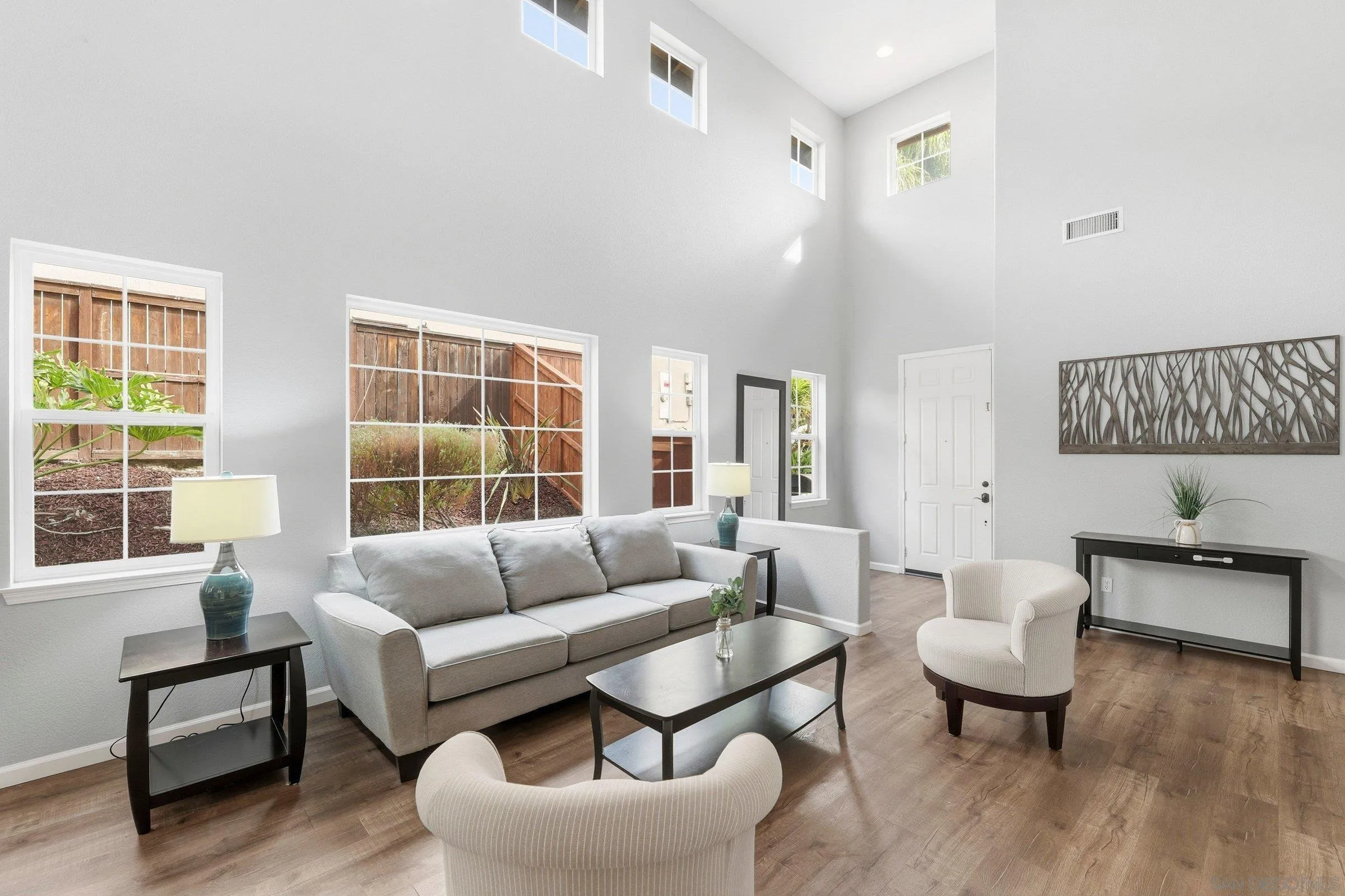 1514 West Borden Road San Marcos, CA 92069 - Photo 2 of 40 a living room with furniture and a large window