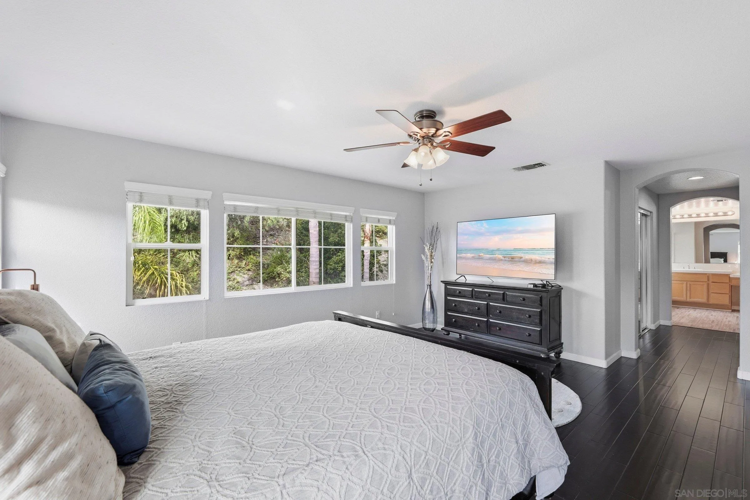 1514 West Borden Road San Marcos, CA 92069 - Photo 22 of 40 a bedroom with a bed dresser and a window