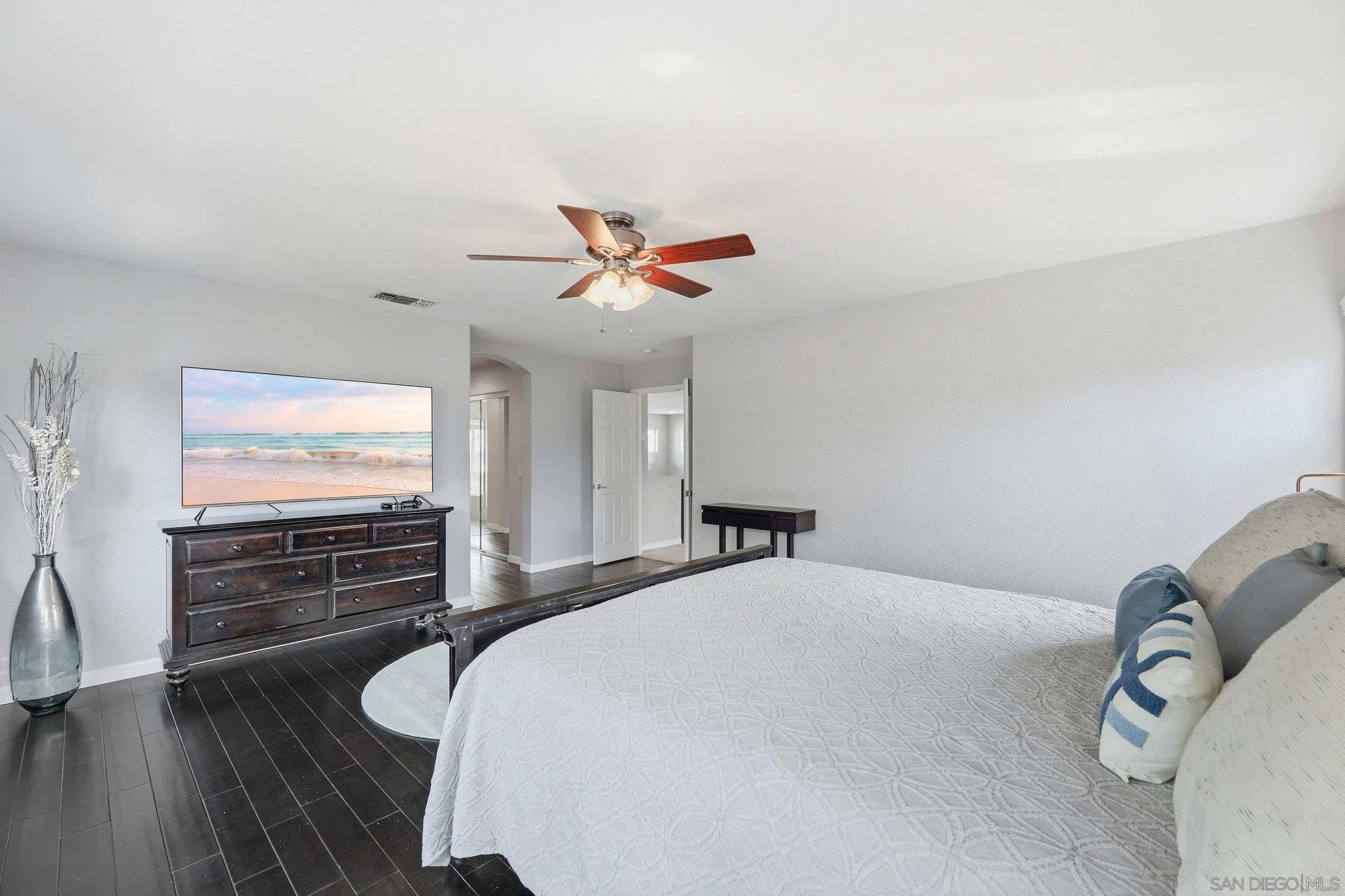 1514 West Borden Road San Marcos, CA 92069 - Photo 23 of 40 a bedroom with a bed and a flat screen tv