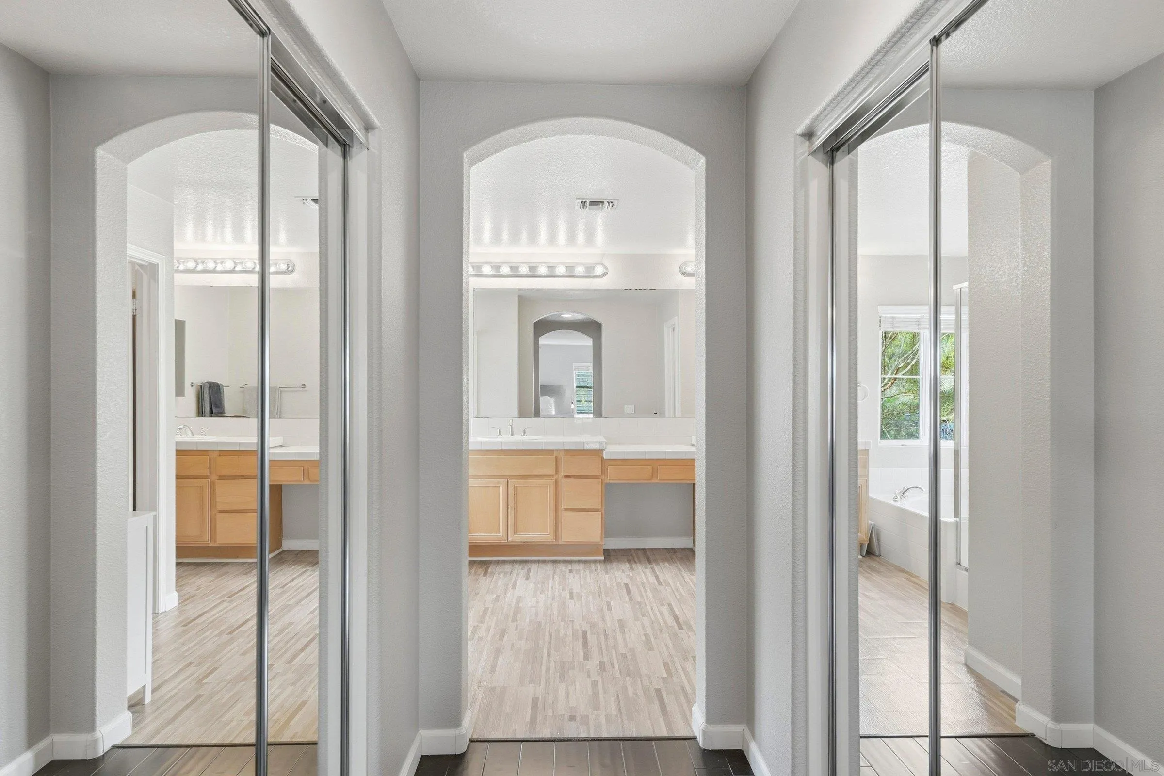 1514 West Borden Road San Marcos, CA 92069 - Photo 24 of 40 a bathroom with a bathtub and a large window