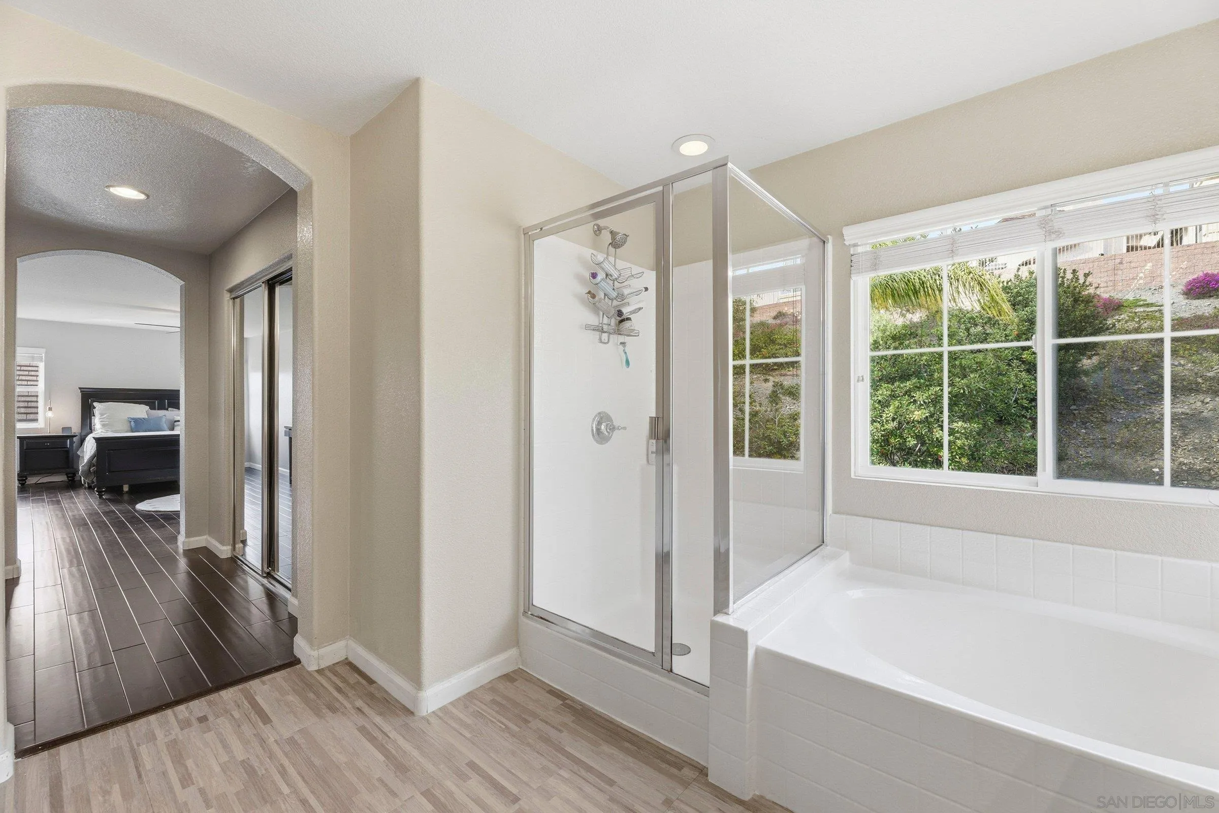 1514 West Borden Road San Marcos, CA 92069 - Photo 25 of 40 a bathroom with a bathtub and a sink