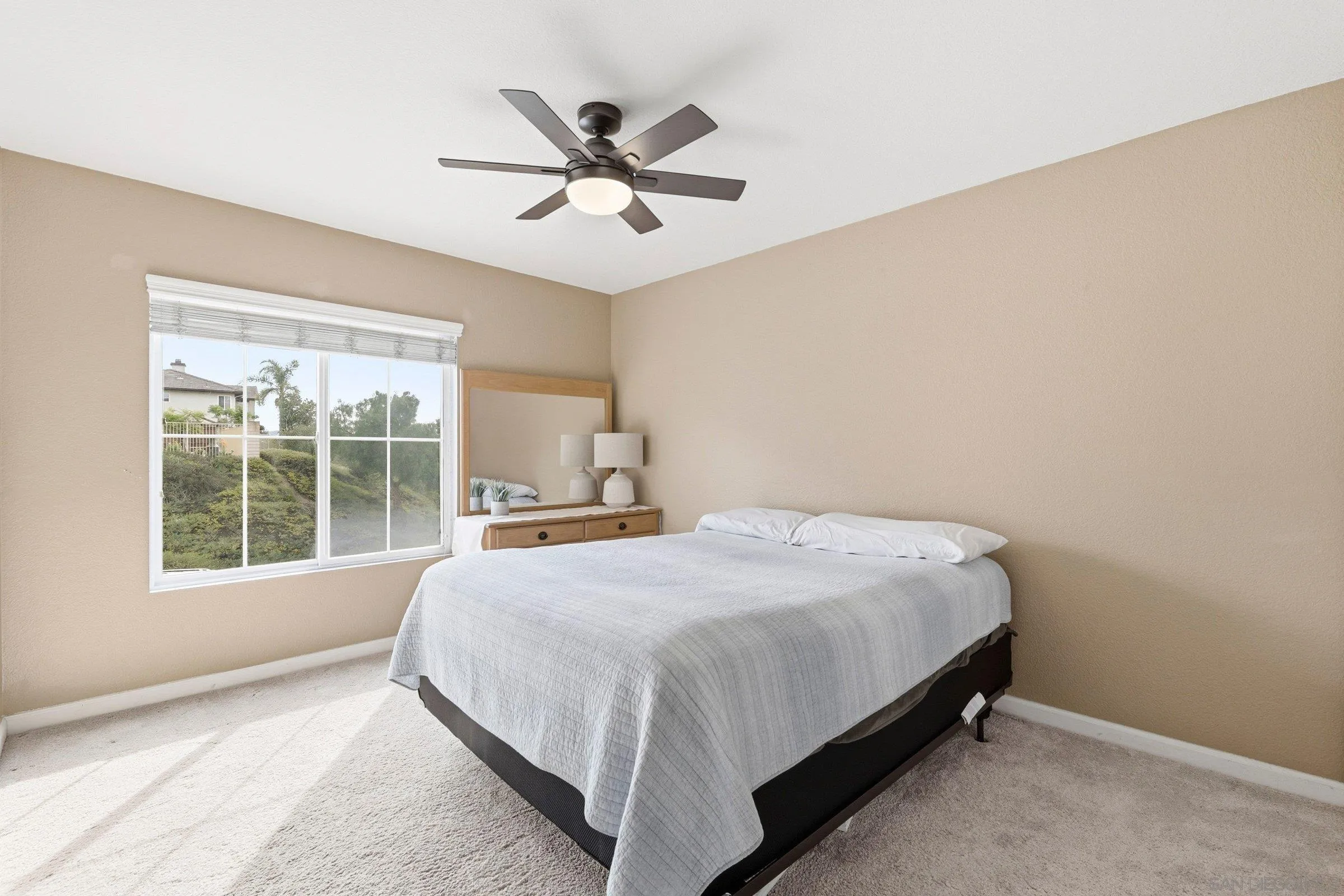 1514 West Borden Road San Marcos, CA 92069 - Photo 28 of 40 a bedroom with a bed and window