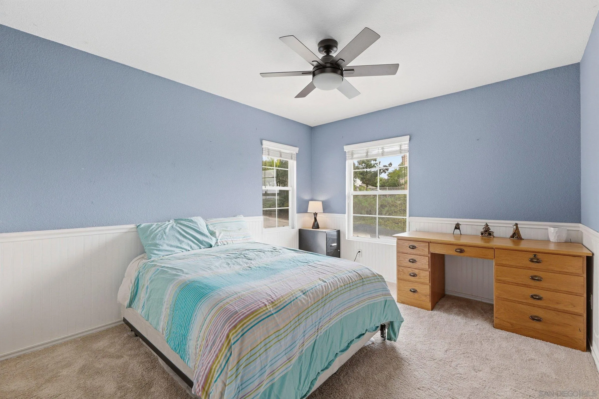 1514 West Borden Road San Marcos, CA 92069 - Photo 33 of 40 a bedroom with a bed and a window