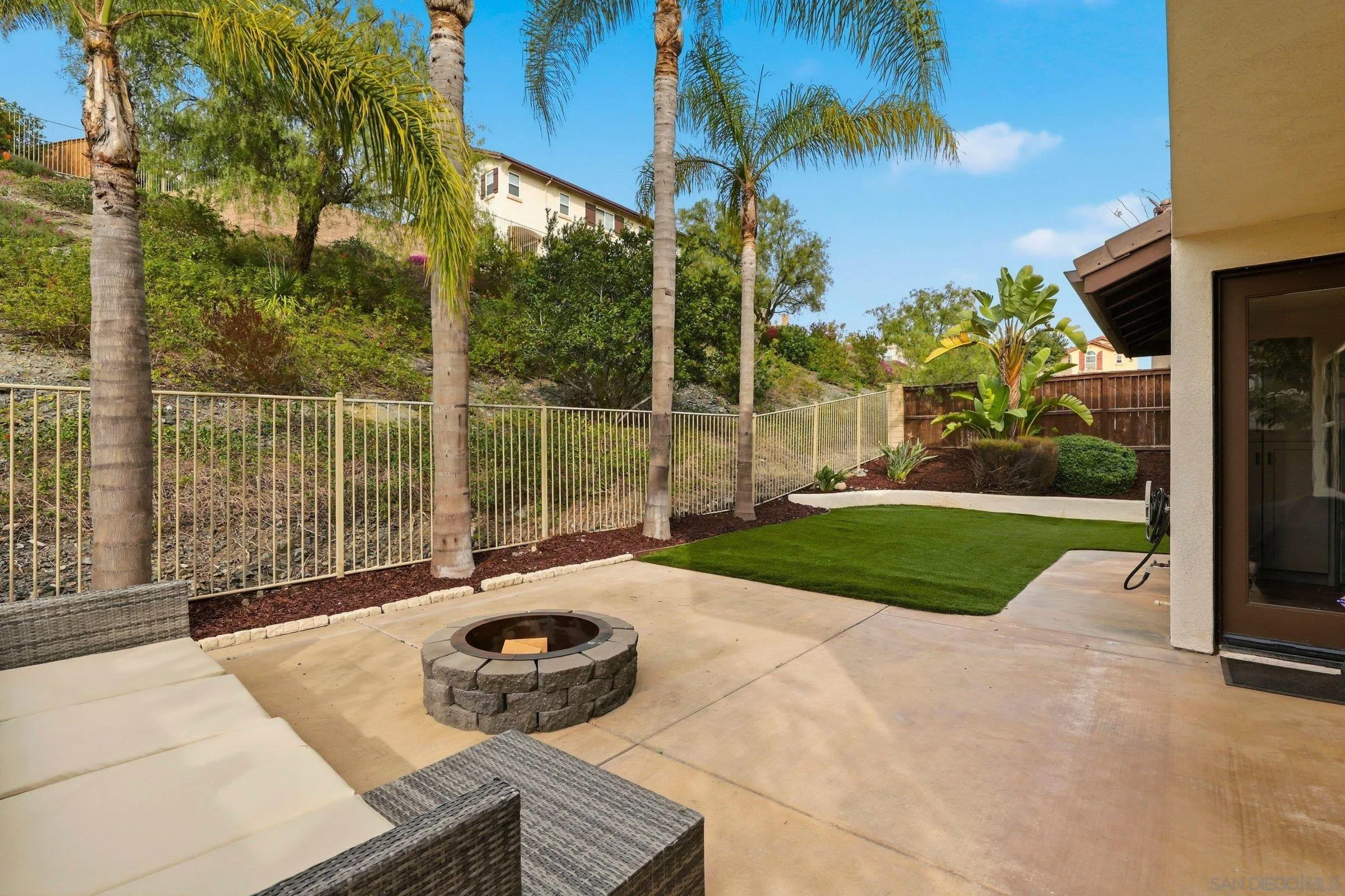 1514 West Borden Road San Marcos, CA 92069 - Photo 35 of 40 a view of a backyard with a garden and plants