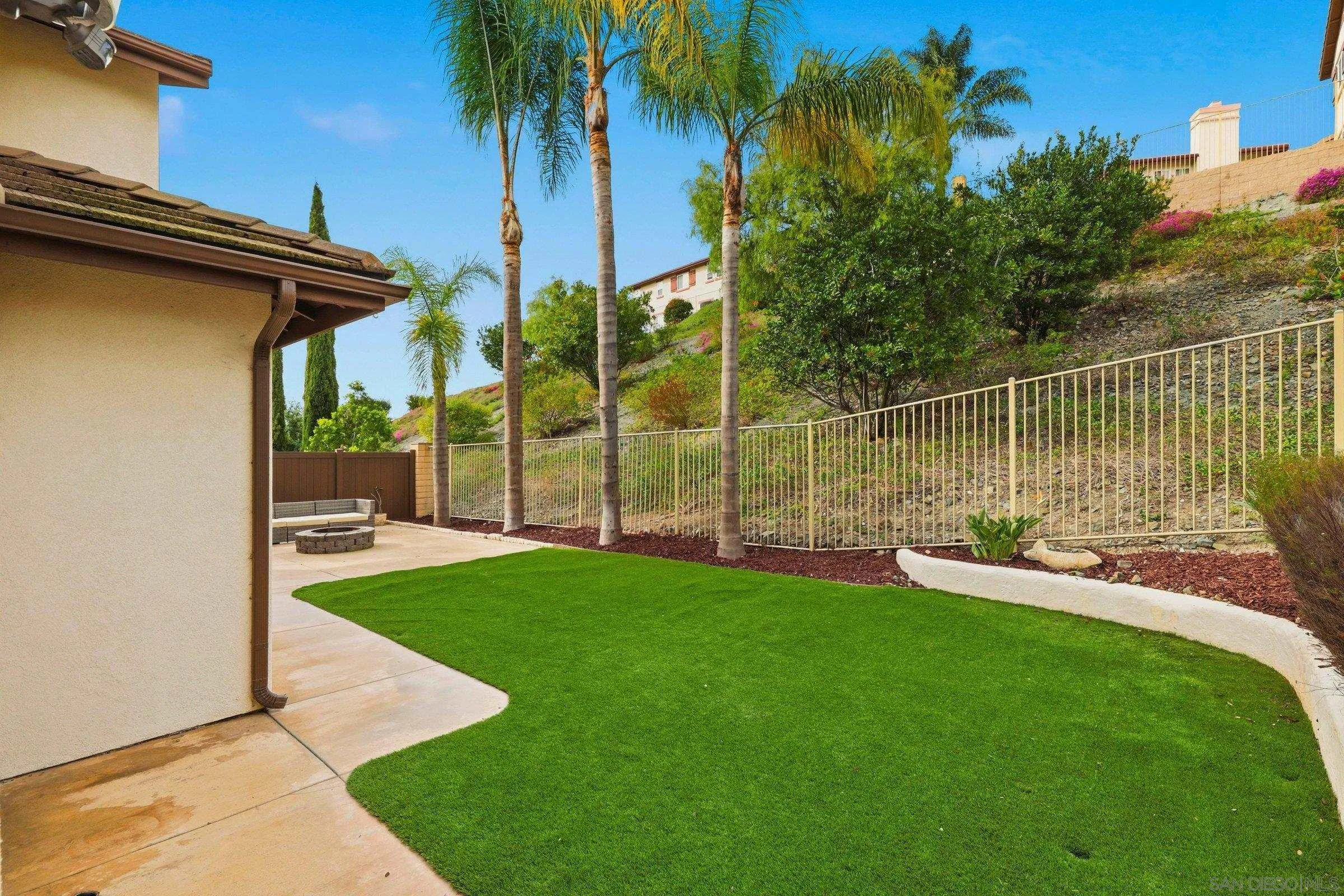 1514 West Borden Road San Marcos, CA 92069 - Photo 36 of 40 a view of a chair and table in the garden