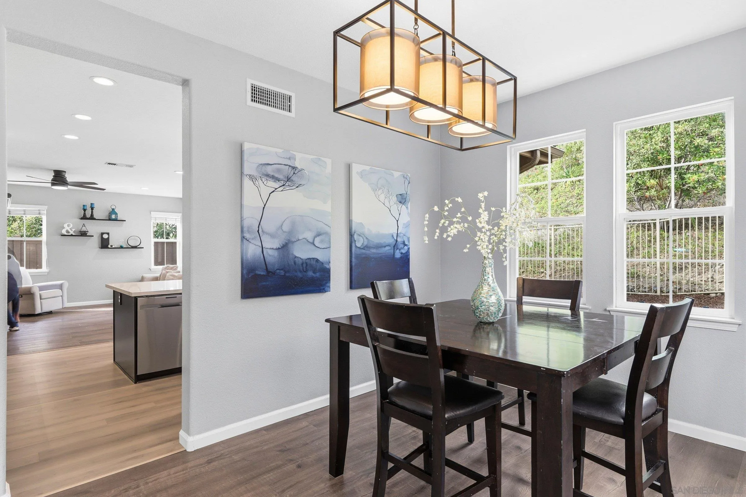 1514 West Borden Road San Marcos, CA 92069 - Photo 7 of 40 a view of a dining room with furniture and chandelier