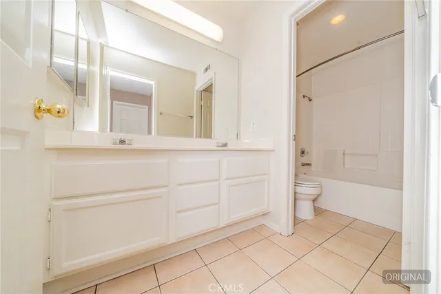 a workspace with furniture and window