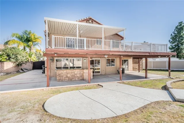 an aerial view of residential house with outdoor space