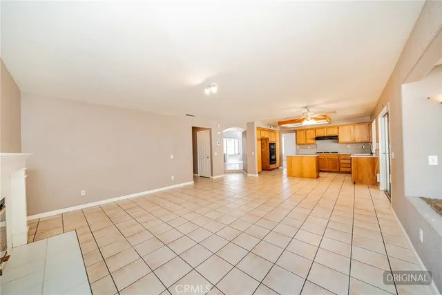 a kitchen with a sink cabinets and appliances