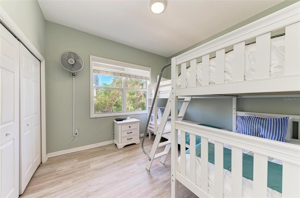 201 57th Street Holmes Beach, FL 34217 - Photo 18 of 48 a white stove top oven sitting inside of a kitchen
