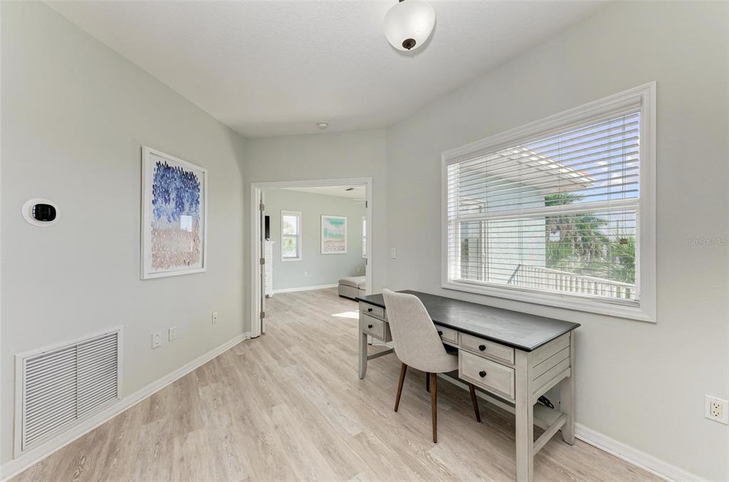 201 57th Street Holmes Beach, FL 34217 - Photo 20 of 48 a dining room with furniture and window