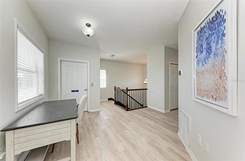 201 57th Street Holmes Beach, FL 34217 - Photo 21 of 48 a room with furniture and window