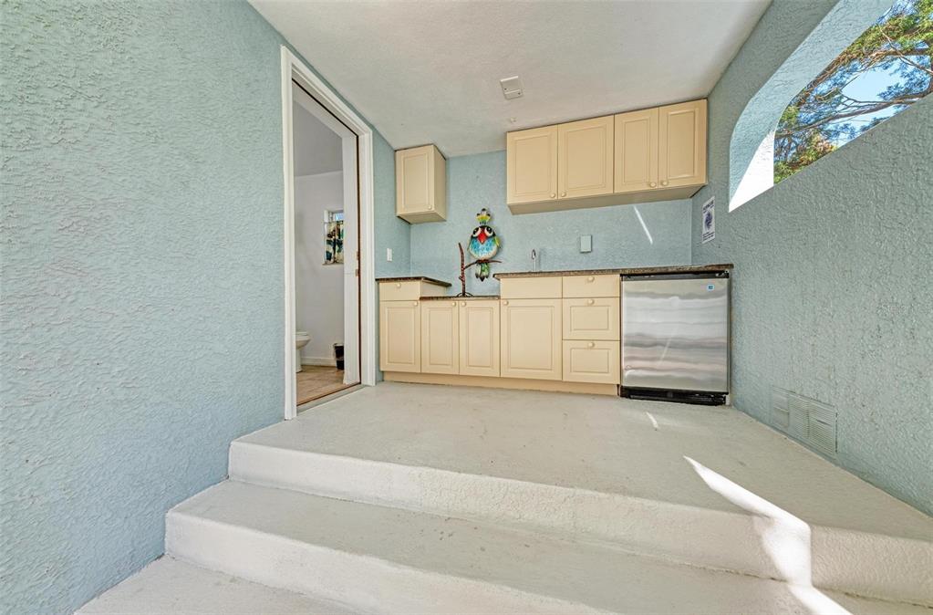 201 57th Street Holmes Beach, FL 34217 - Photo 33 of 48 a view of a kitchen with sink and cabinet