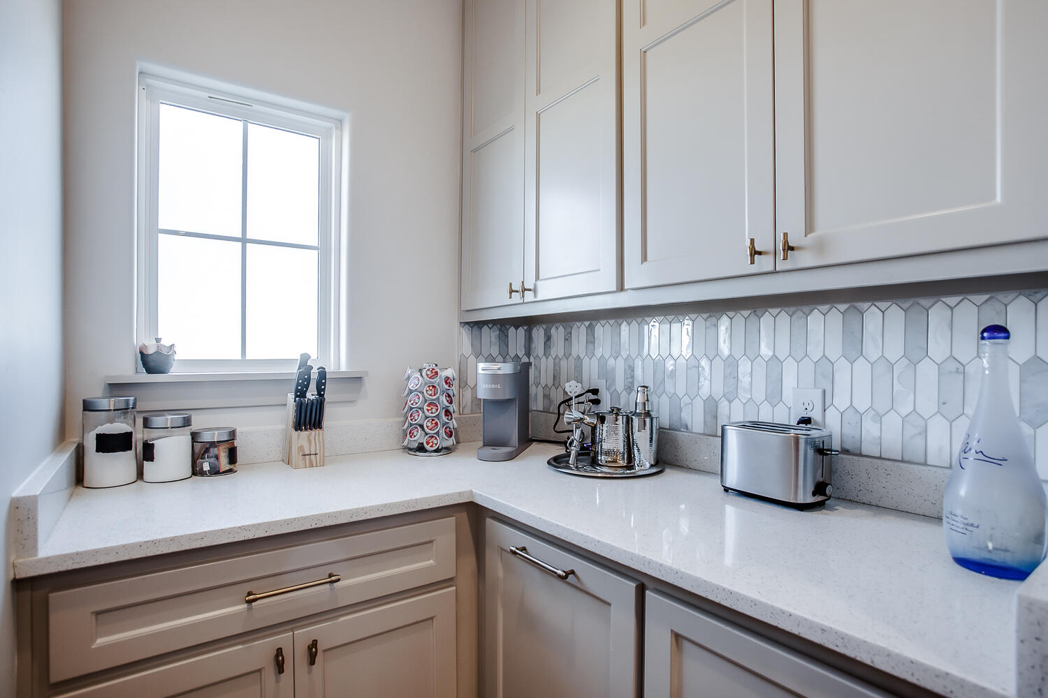 7601 53rd Street Lubbock, TX 79407 - Photo 12 of 33 a kitchen with a sink cabinets and window