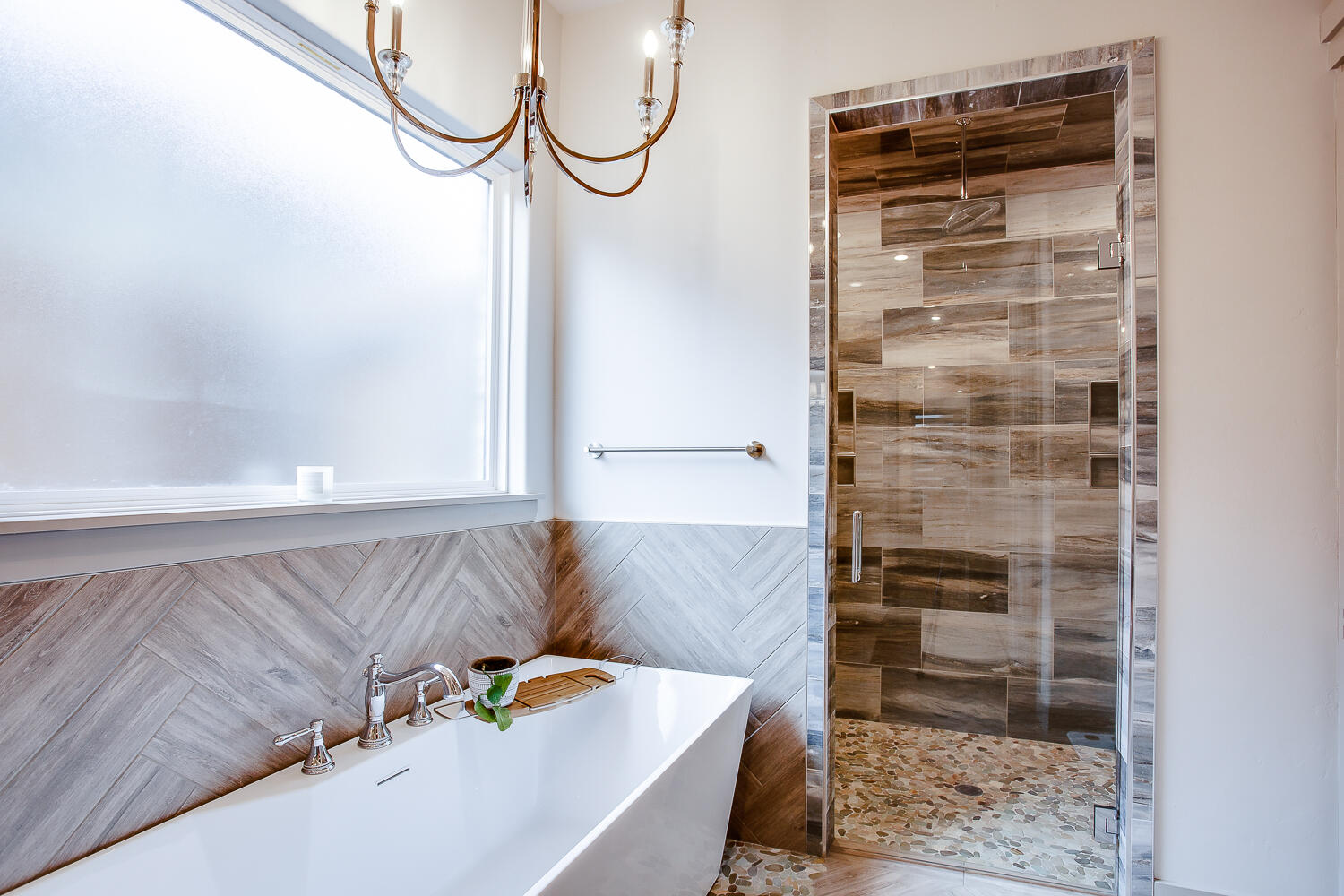7601 53rd Street Lubbock, TX 79407 - Photo 17 of 33 a bathroom with a bathtub and a shower