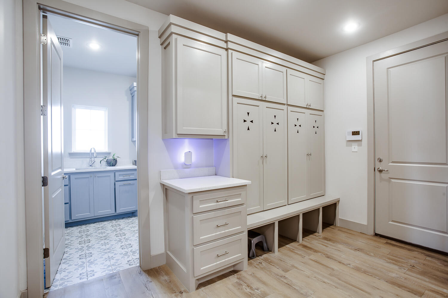7601 53rd Street Lubbock, TX 79407 - Photo 19 of 33 a kitchen with a refrigerator sink and cabinets